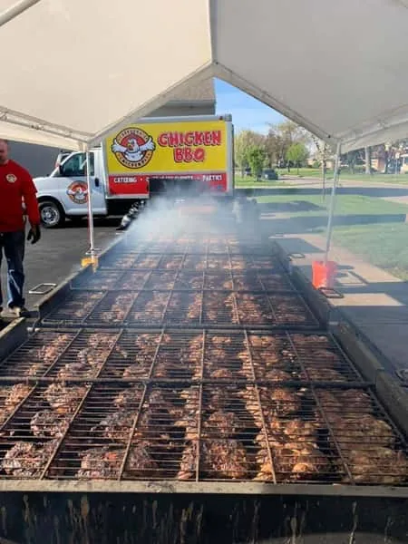 Chicken cooking on the open grill