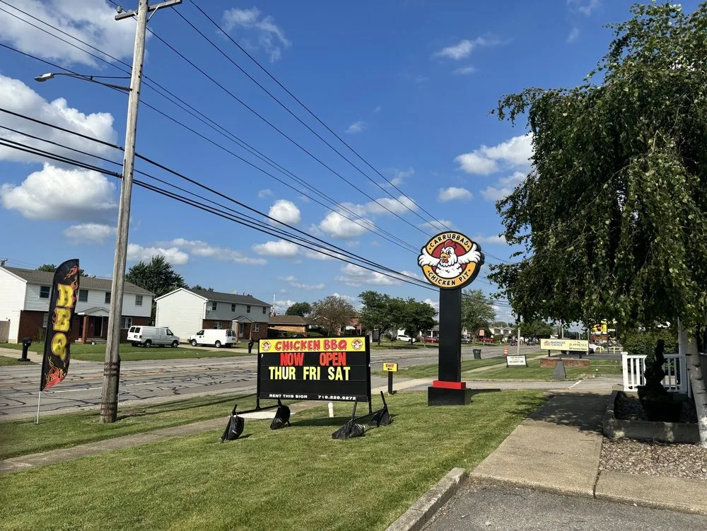Carrubba's Chicken Pit storefront sign on George Urban Blvd in Depew, NY